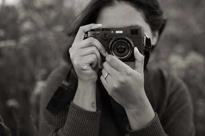 woman pointing camera