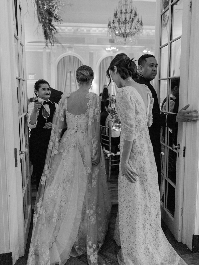 Bride in Monique Lhuillier walks with her father down the aisle at her wedding in Ravello at Villa la Rondinaia