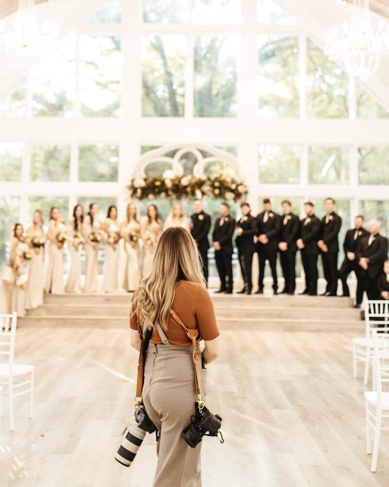 photographer taking wedding photo