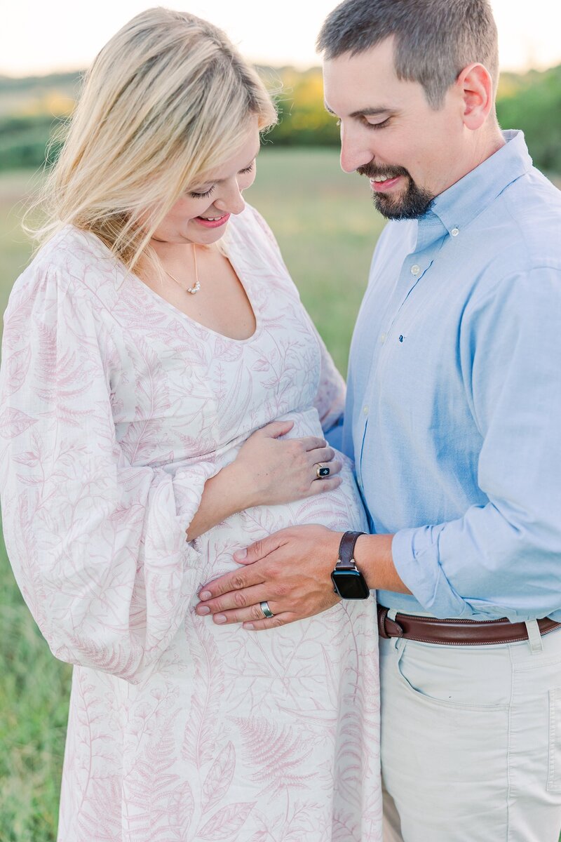 Elegant maternity portraits in Charlottesville, VA, celebrating the beauty and love of expecting parents