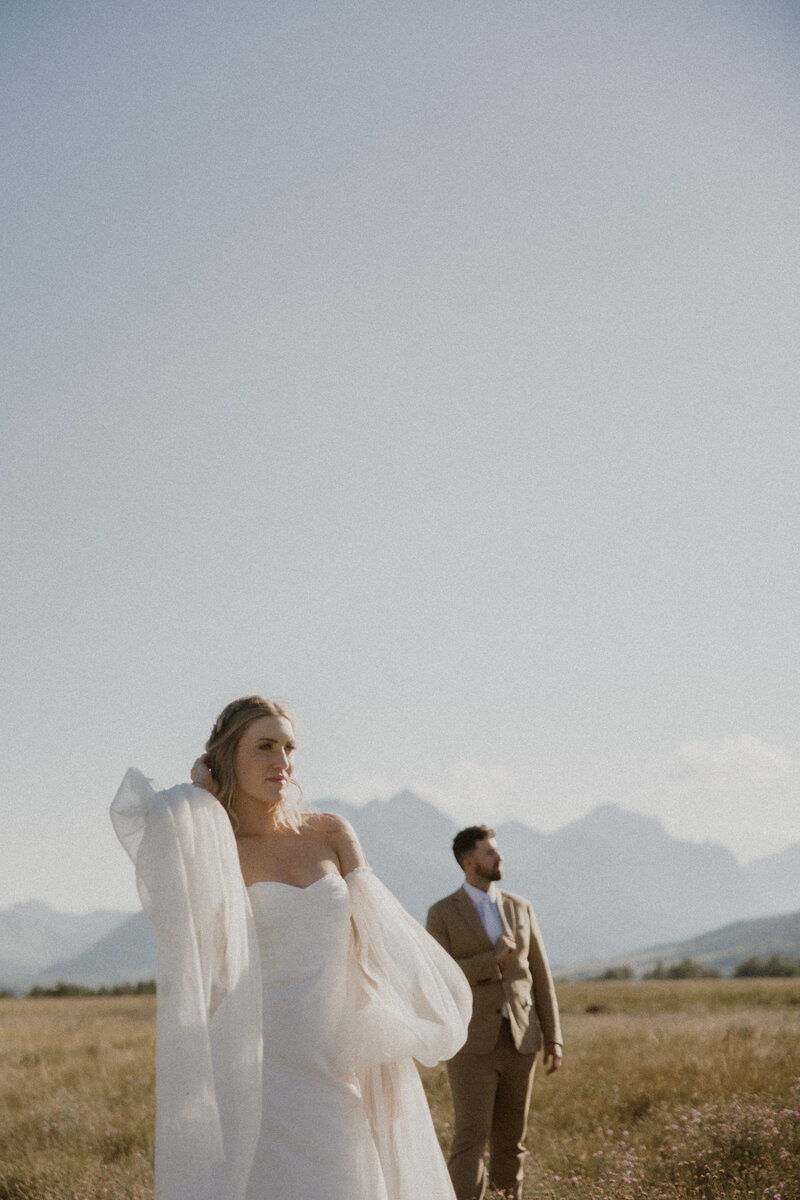 photo of bride and groom during their montana elopement with bride holding onto groom