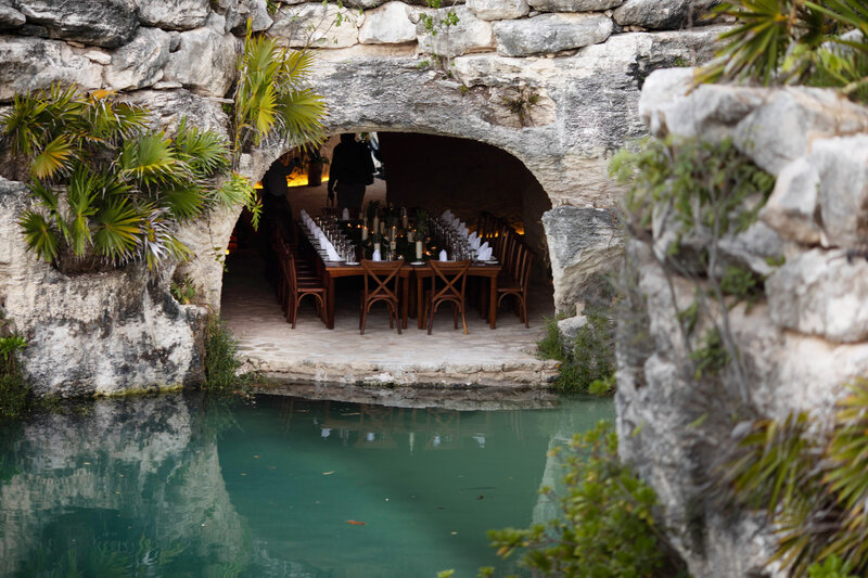 bride and groom walking on beach at cancun wedding