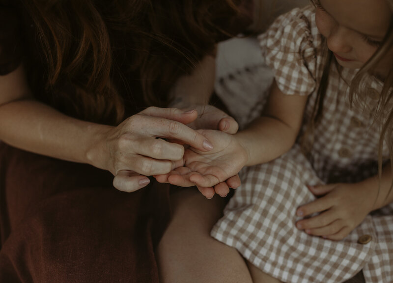 Motherhood photos in a field