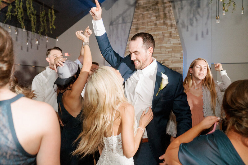 Reception decor in Canyonwood Ridge hall with romantic lighting and Hill Country details