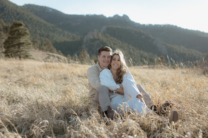 A couple dancing and kissing during their engagement shoot in Victor, Idaho.