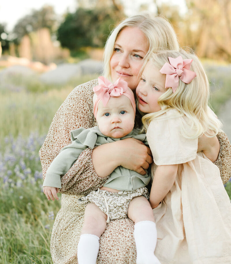 Mother holds her two girls - captured by Tevi Hardy, best family photographer in Bay Area