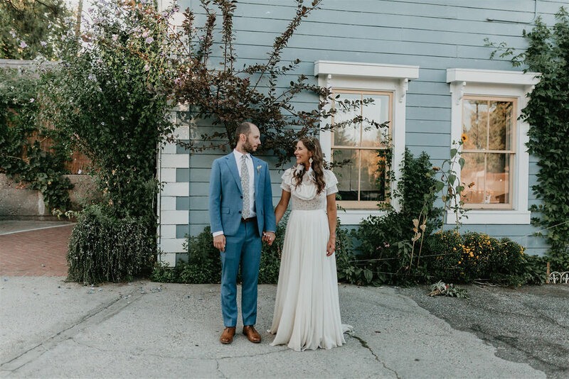 bride and groom looking at eachother