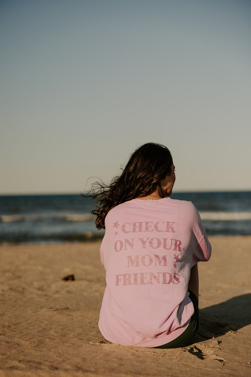 Therapist holding a blue cup of coffee