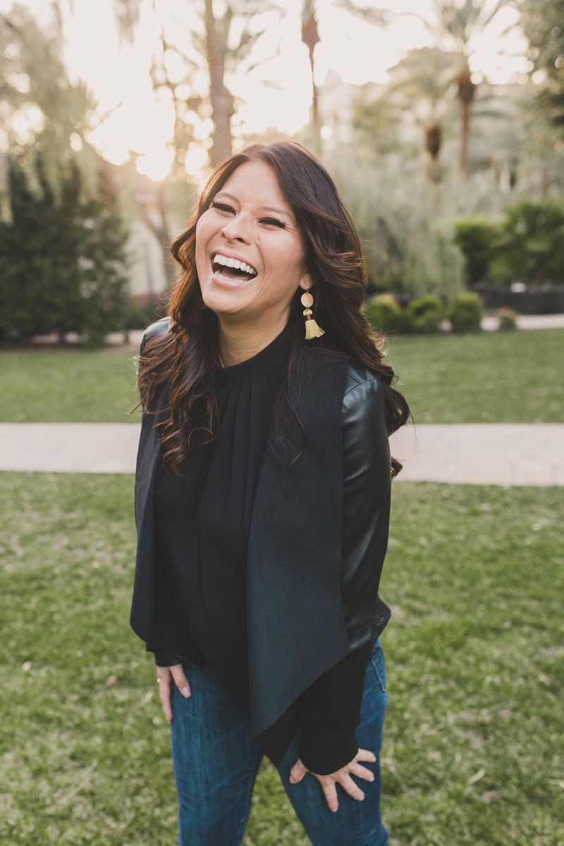 las vegas female entrepreneur laughs during branding photos