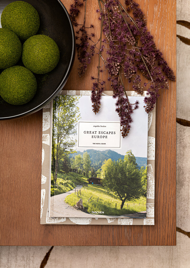 Detail shot of a curated and styled coffee table in a Modern Park City remodel by Sister Studio