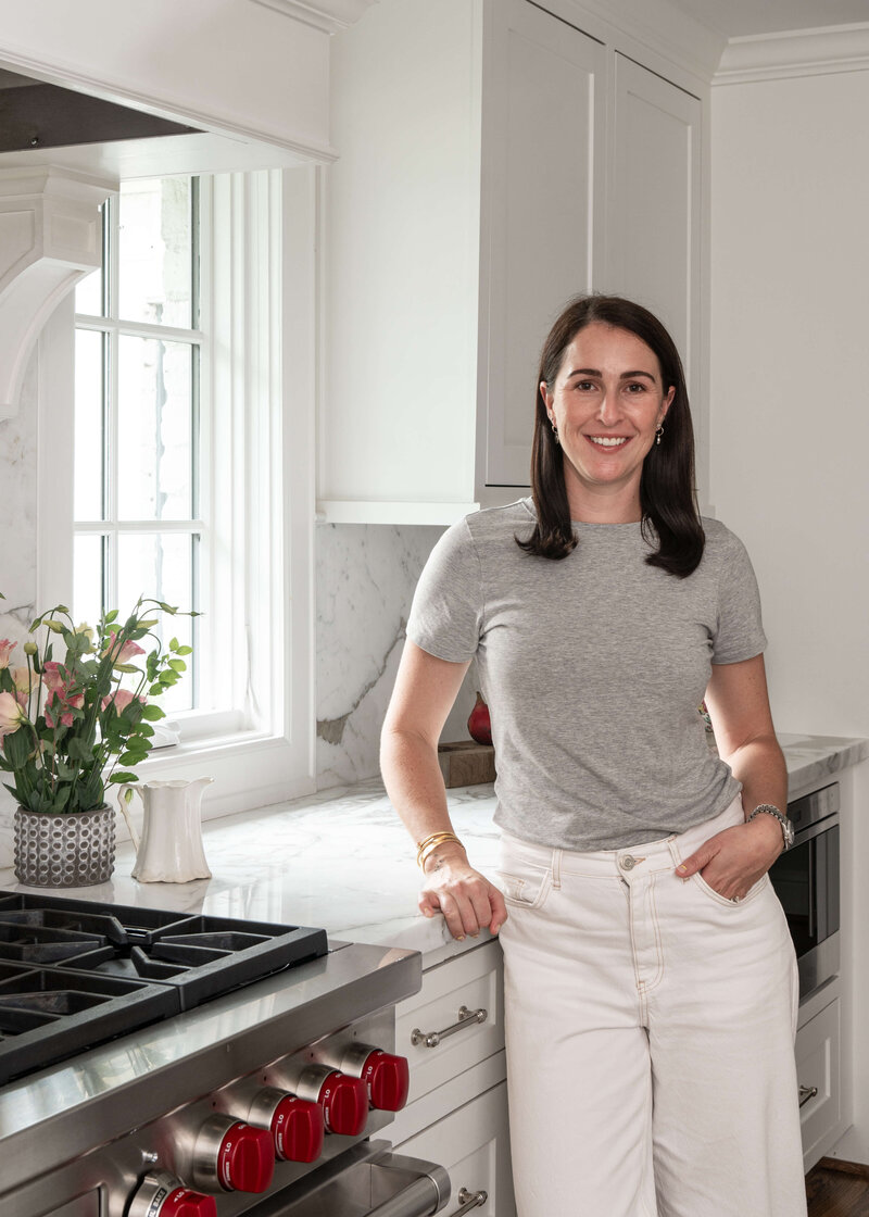 Megan standing in a kitchen