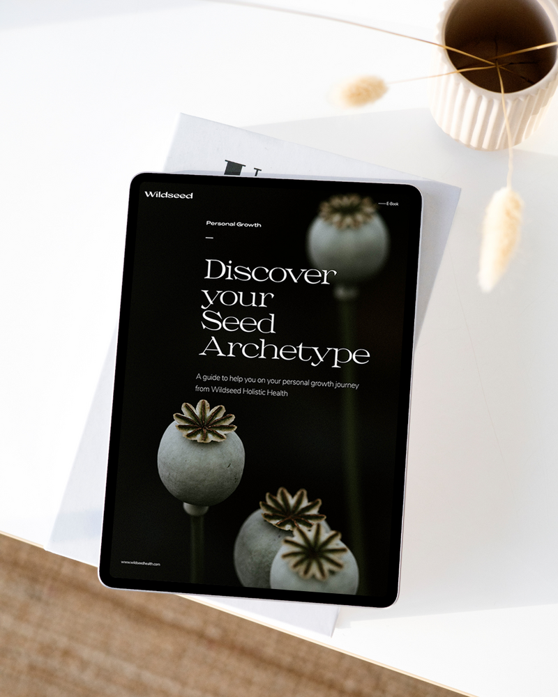 ‘Discover Your Seed Archetype’ opt-in page displayed on an iPad, set in a flat lay on a table, inviting users to explore their unique wellness journey.