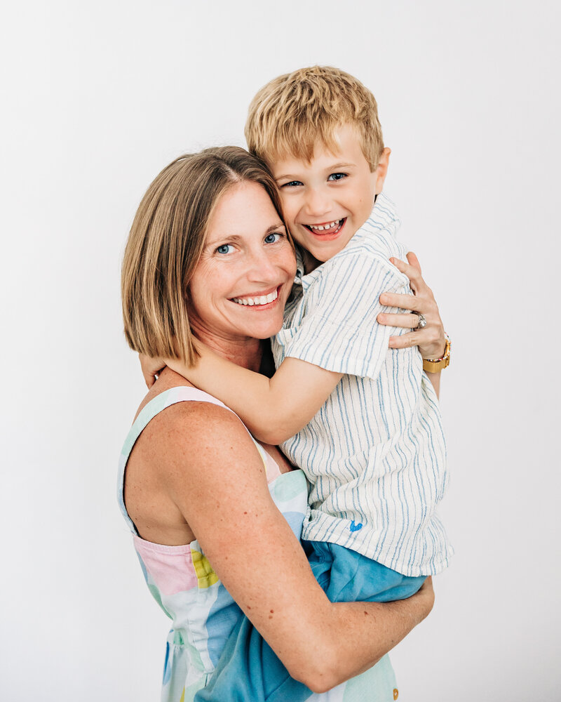 Alison and her son embracing in a cute family photo in St. Pete