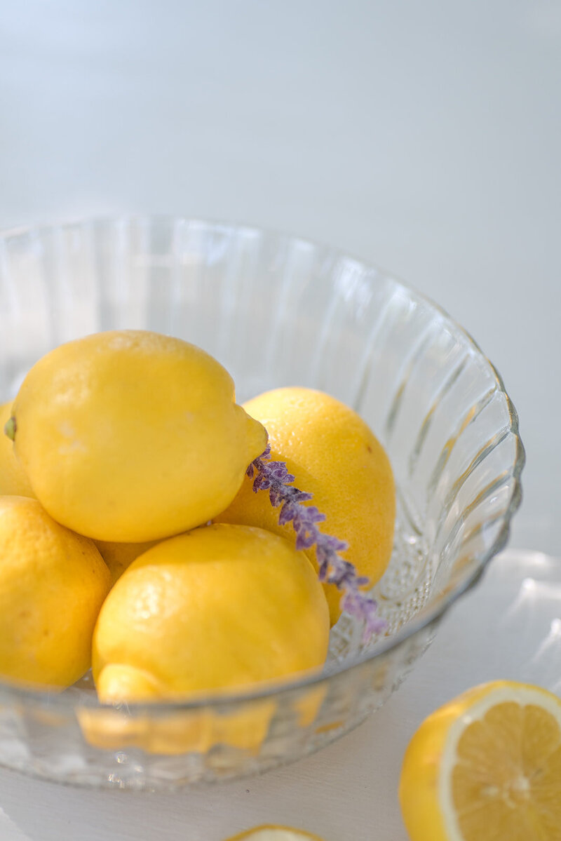 bowl of lemons with lavendar