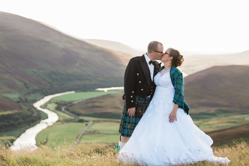 Couple kissing in Scotland