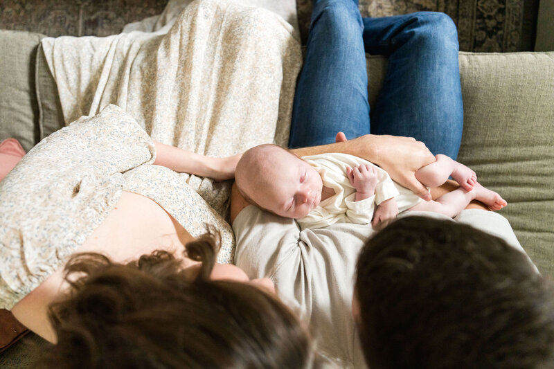 Capturing the joy of a cuddly newborn during an in-home photography session in Austin