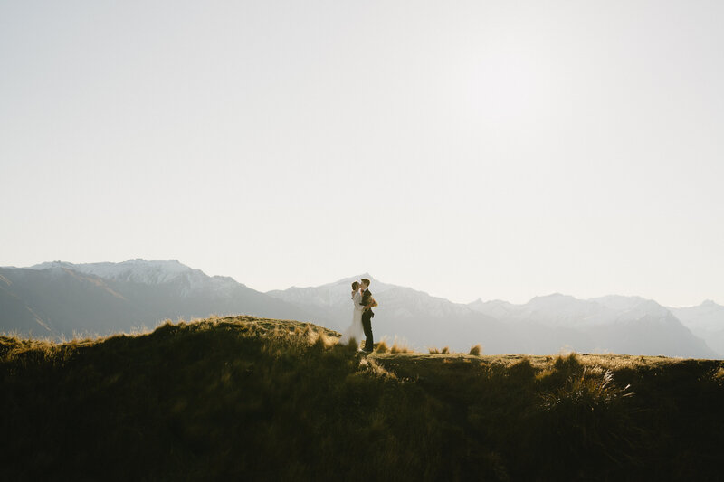 bride-and-groom-having-wedding-photos-at-coromandel-peak