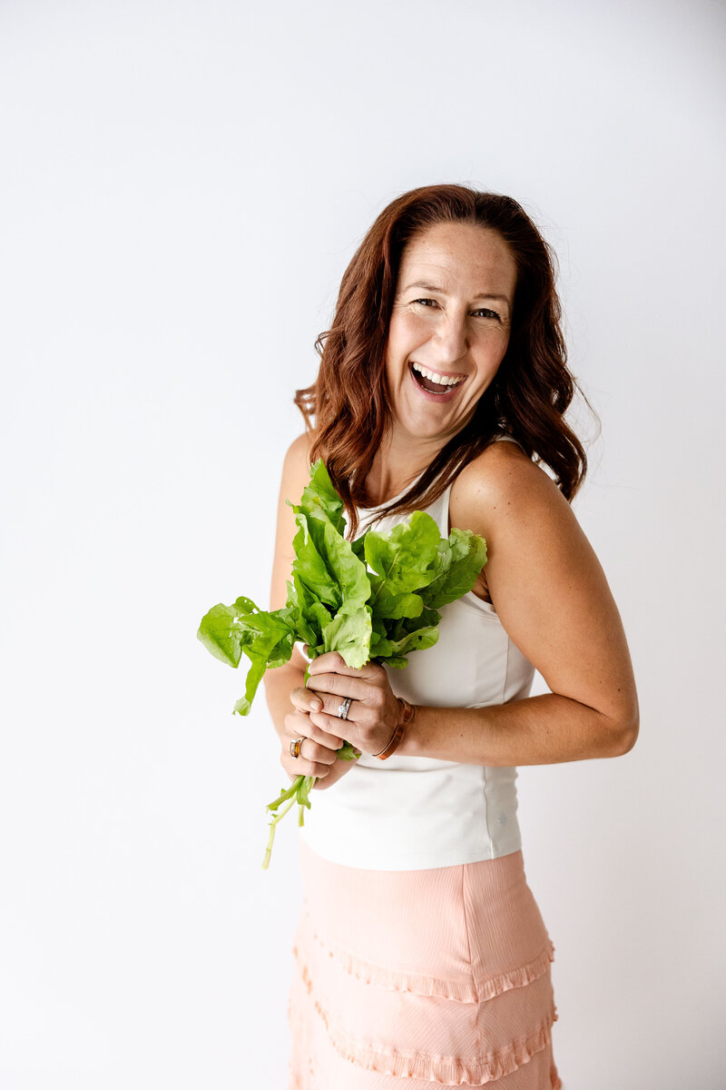 Women owned creative entrepreneurs celebrating at brand photoshoot