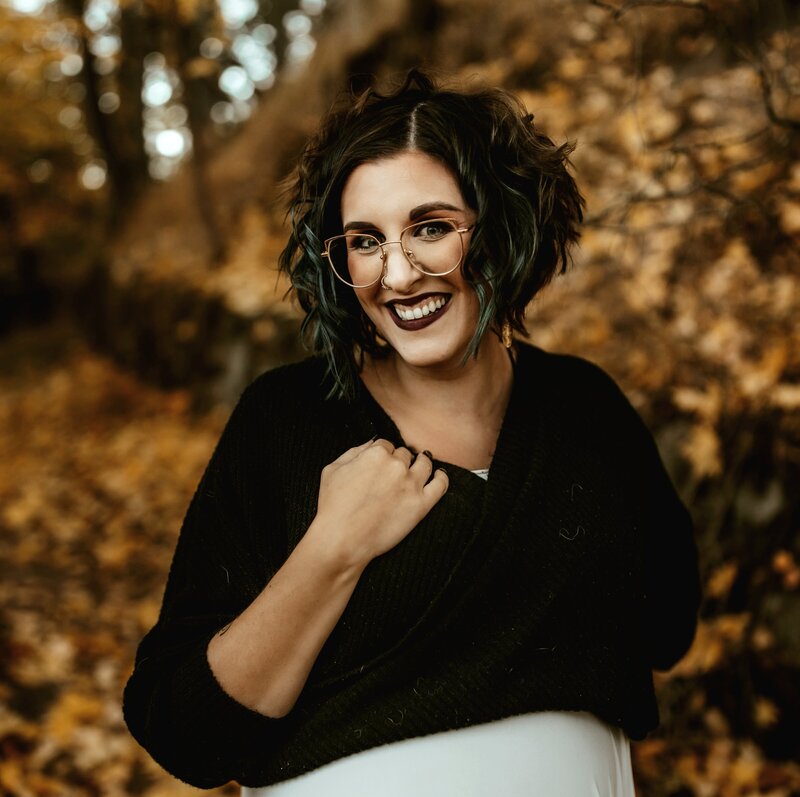 Kalispell Denture Studio's office manager, Beverly,  smiles at the camera.