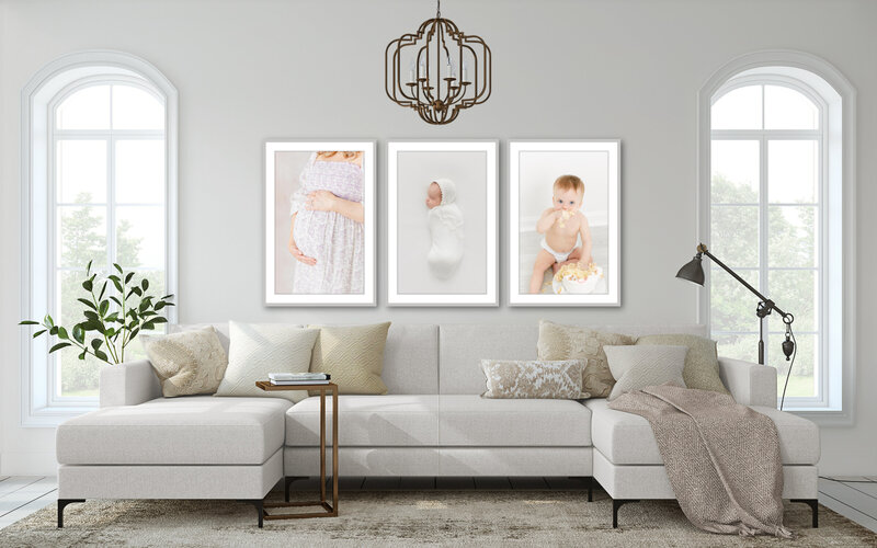 3 large images on the wall in a living room from a Northern Virginia Newborn Photographer photoshoot