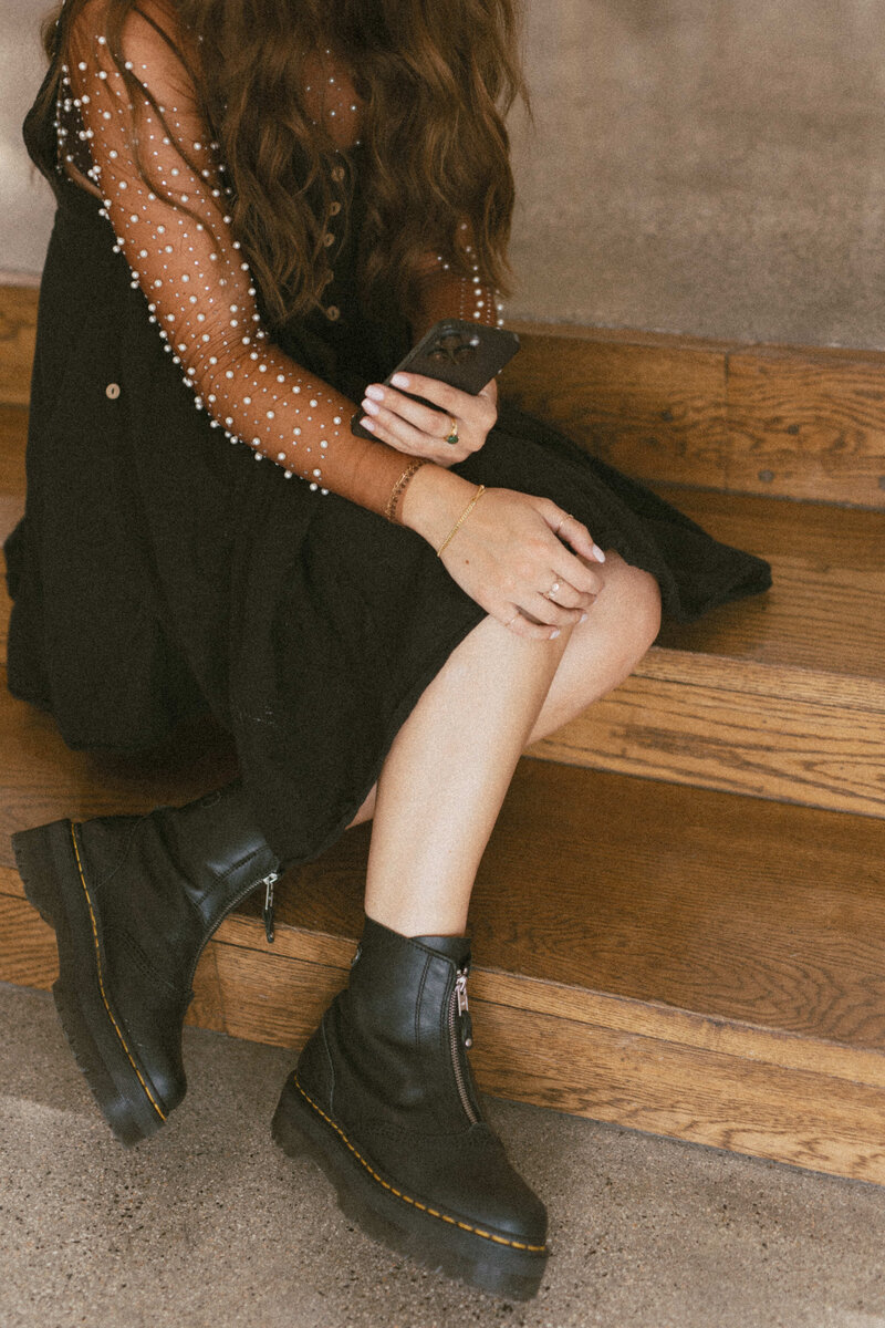 Girl on Phone in brown Leggings