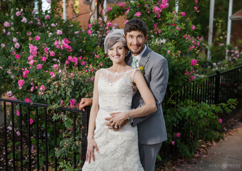 Wedding photography with the pink roses at the Dushanbe Tea House in Boulder