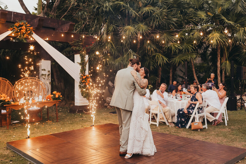 Group photo session with many mothers holding children during golden hour