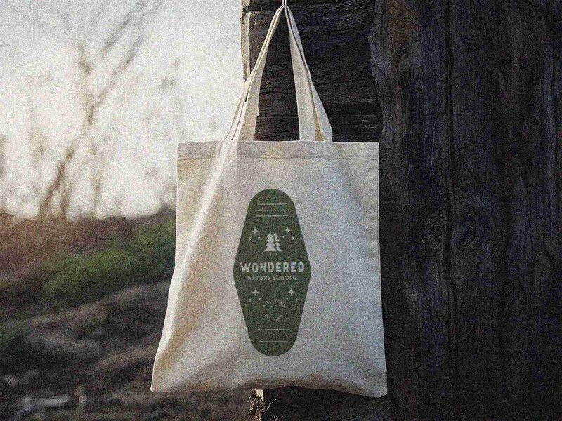 A trendy tote bag, showcasing a fun design, perfect for students at Wondered Nature School.