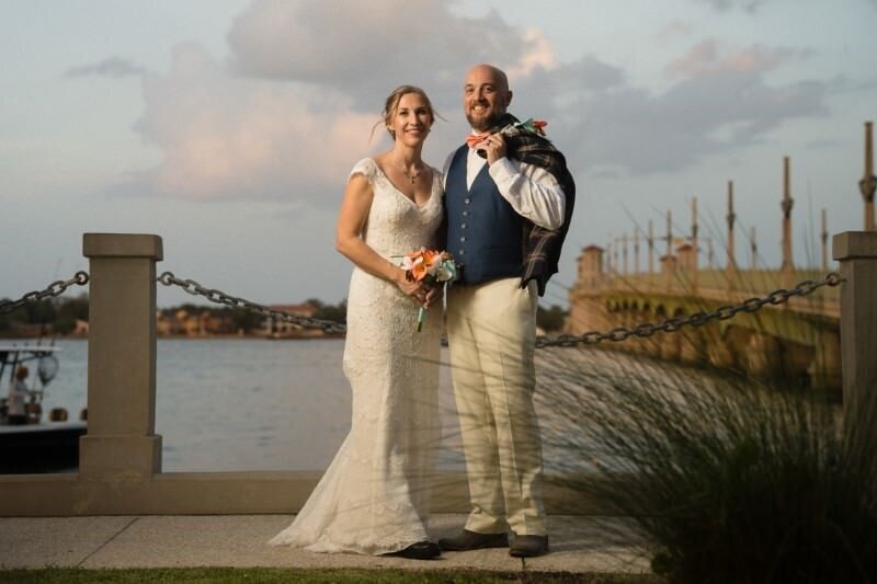 Bride and groom by bayfront