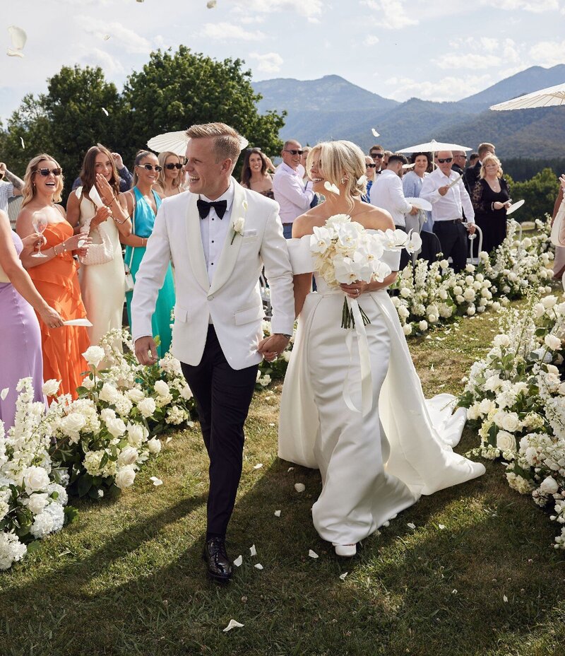 bride_groom_walking_at_ceremony