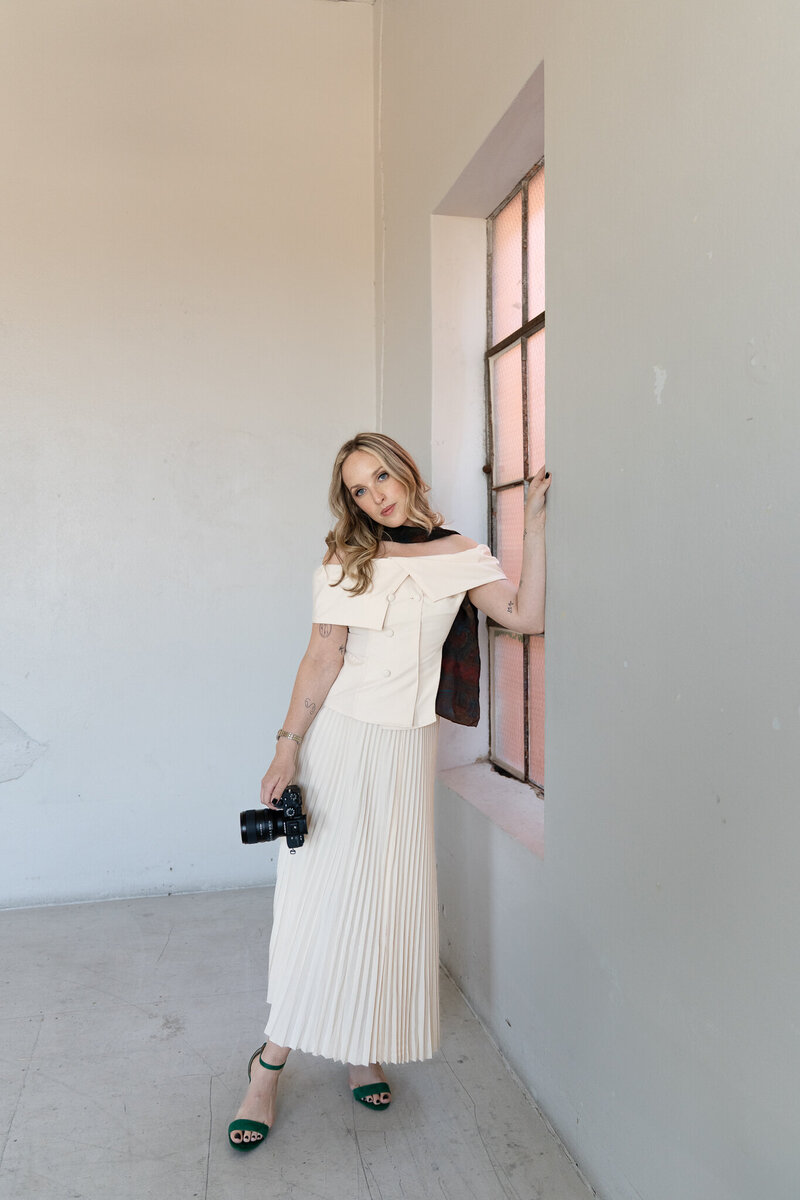 Editorial branding portrait featuring a luxury wedding photographer 