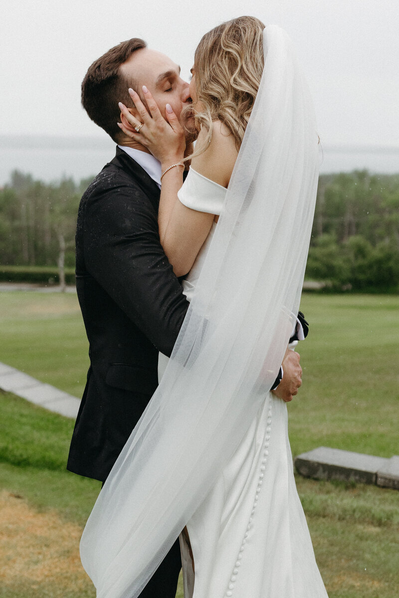 Couple Kiss as they walk to their Tuscan Villa