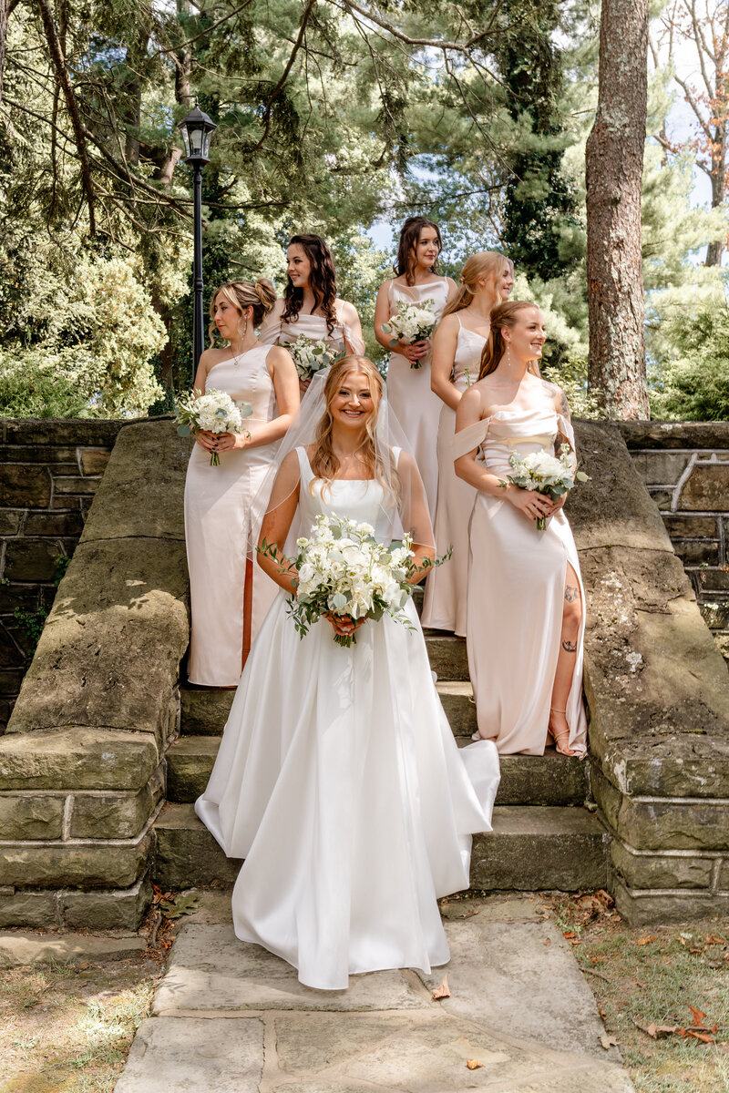 Traveling wedding photographer photographs bride and groom at the Bailey Barns Venue.