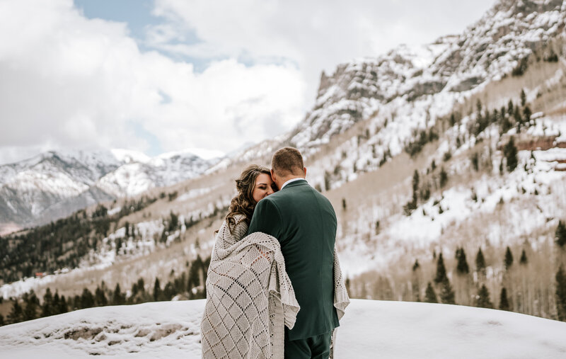 telluride elopement in winter, bride and groom at mt sneffels