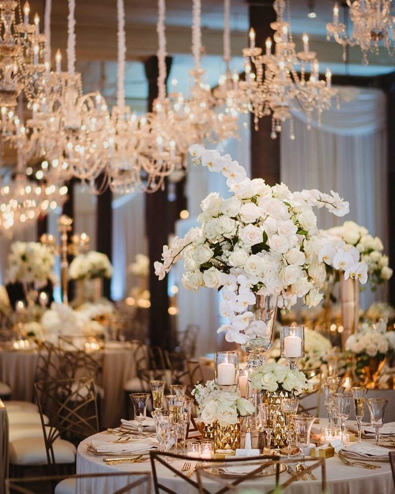 A stunning wedding reception in Houston, Texas with beautiful peony table arrangements.