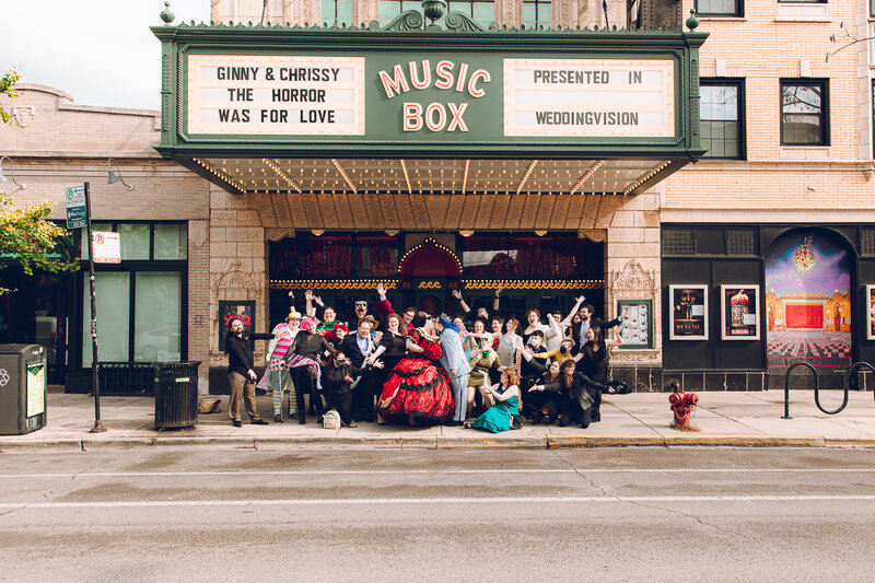 A couple with their guests celebrate their wedding on Halloween at Music Box Chicago