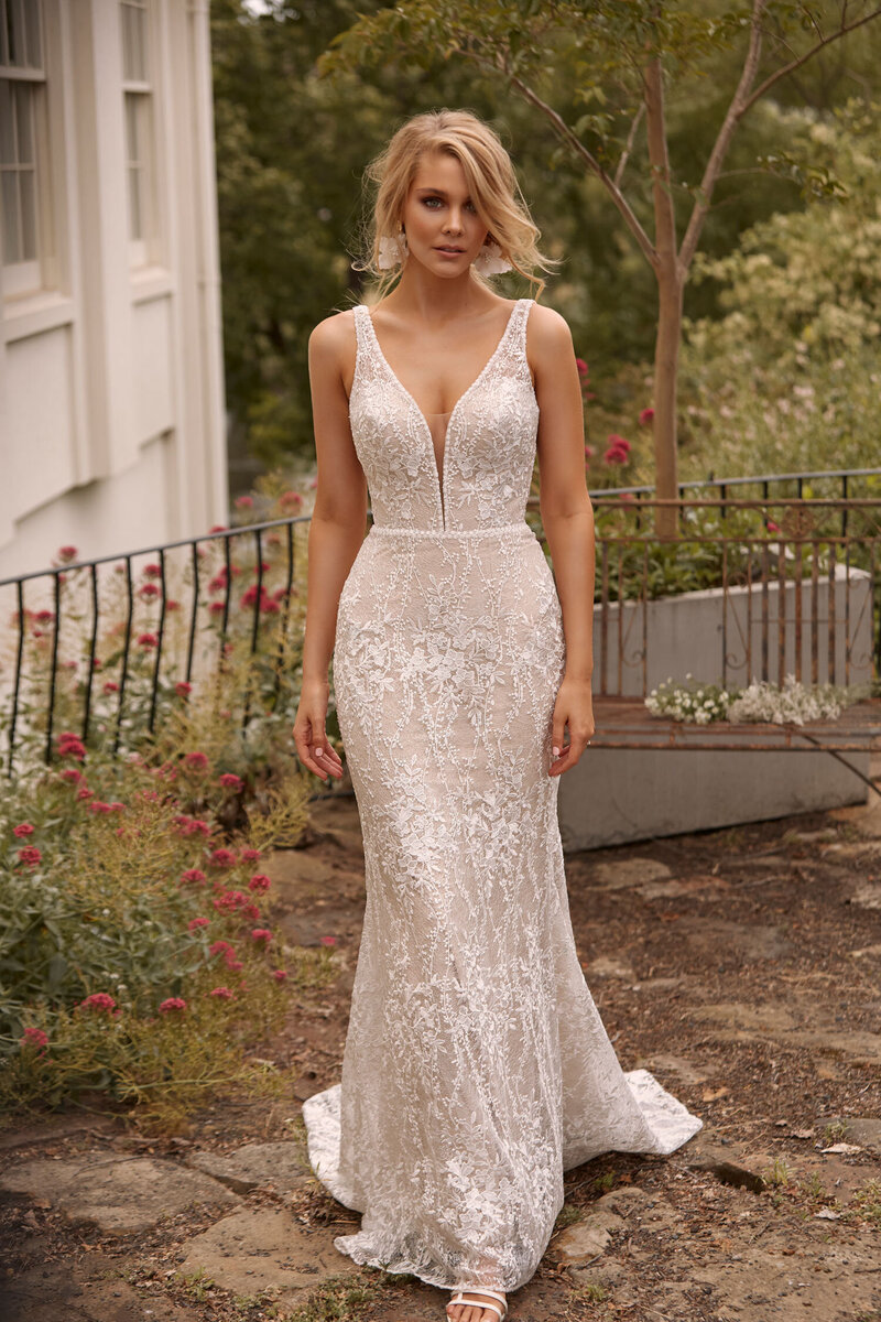 CAYLA-ML20051-FULL-LENGTH-FITTED-FLORAL-LACE-GOWN-WITH-ILLUSION-STRAPS-DEEP-V-NECKLINE-LOW-SCOOP-BACK-ZIPPER-CLOSURE-DETACHABLE-TULLE-OVERSKIRT-INCLUDED-WEDDING-DRESS-MADI-LANE-BRIDAL-1
