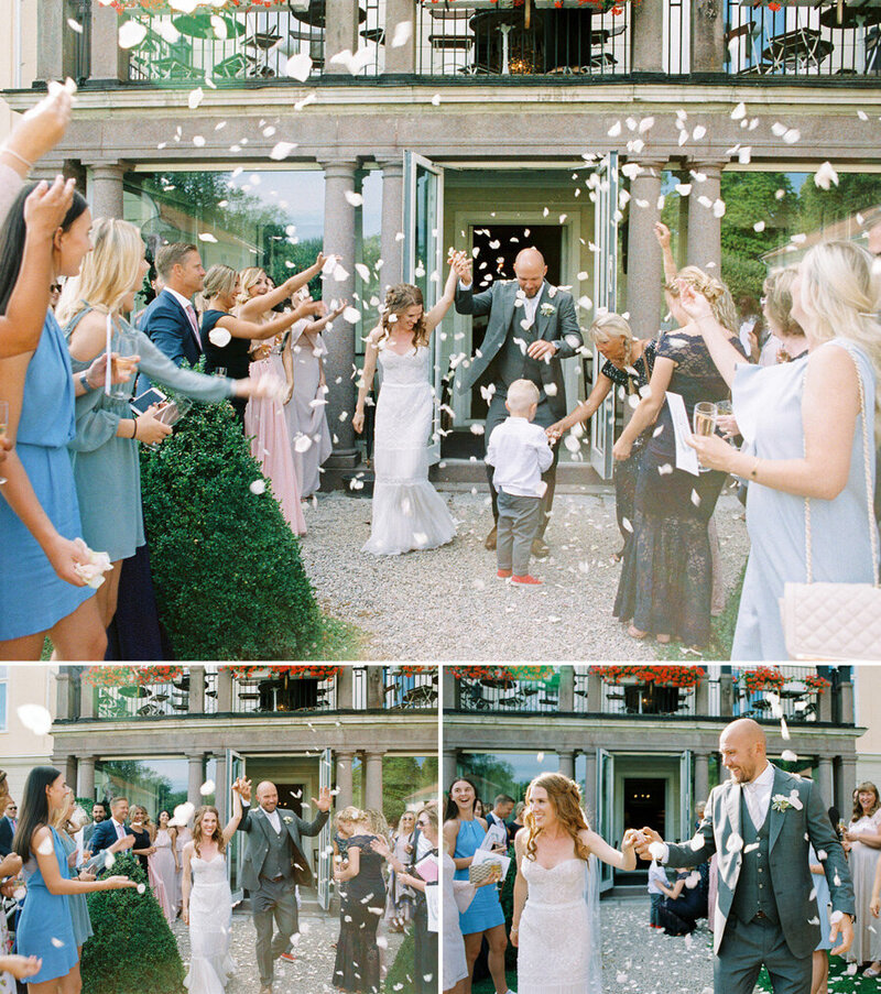 030-bride-and-groom-walking-out-from-the-ceremony-and-white-rose-petals-are-being-tossed
