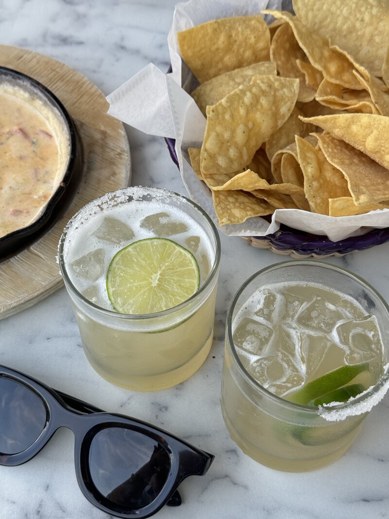 Spicy margarita with tortilla chips, representing Alexa Lucky Creative’s fun, laid-back brand vibe for female entrepreneurs