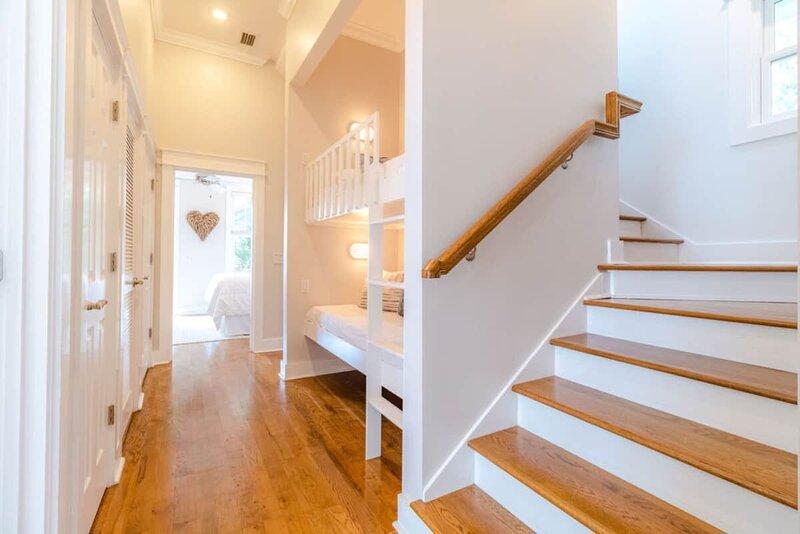 wooden stairs and bunk beds