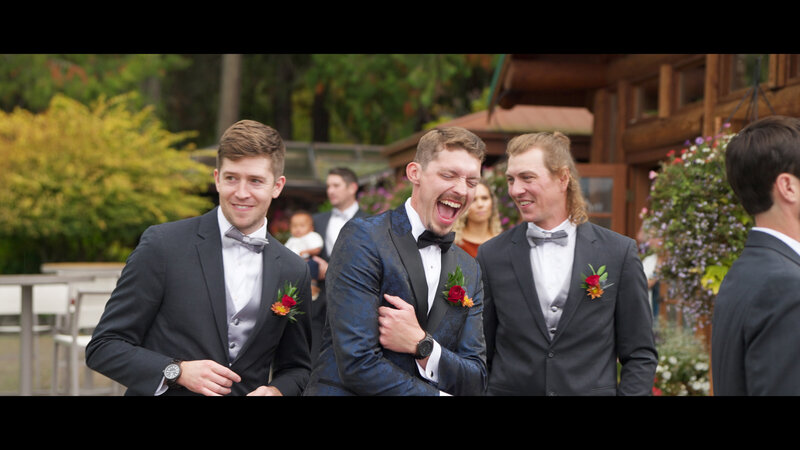 groom and groomsmen laughing
