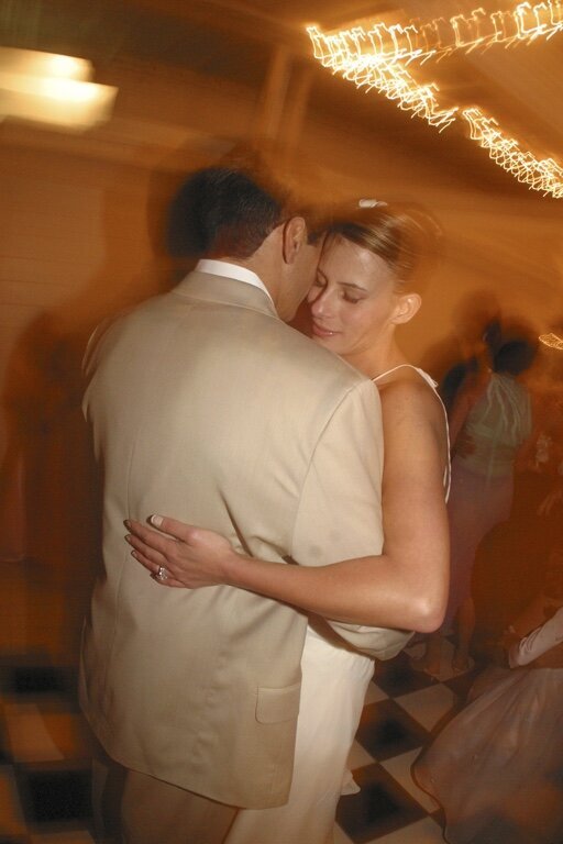Caroline Morey Wedding Photographer Couple Embrace First Dance Malibu Beach Wedding Romantic Motion Blur MISC0047