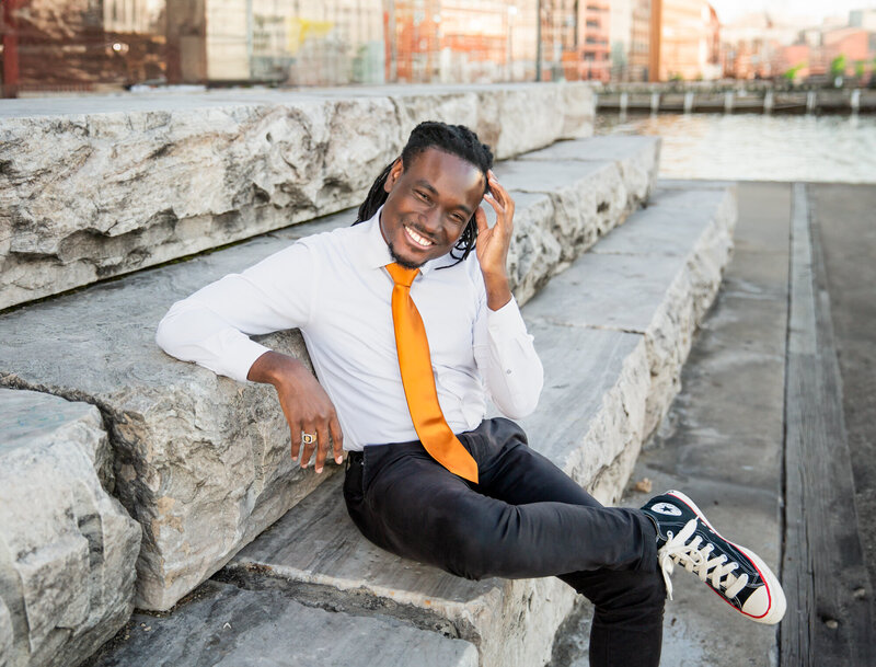 A-Black-Baltimore-Business-Owner-laughs-during-Branding-session-at-Fells-Point-near-the-Inner-Harbor.