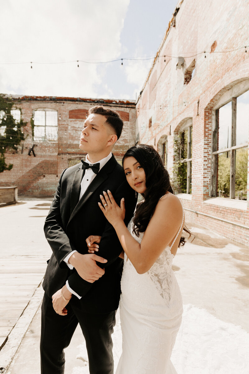 Tinted-Events-Design-and-Planning-latin-couple-wedding-portrait-industrial-venue-simplamor-photography-tintedeevents.com