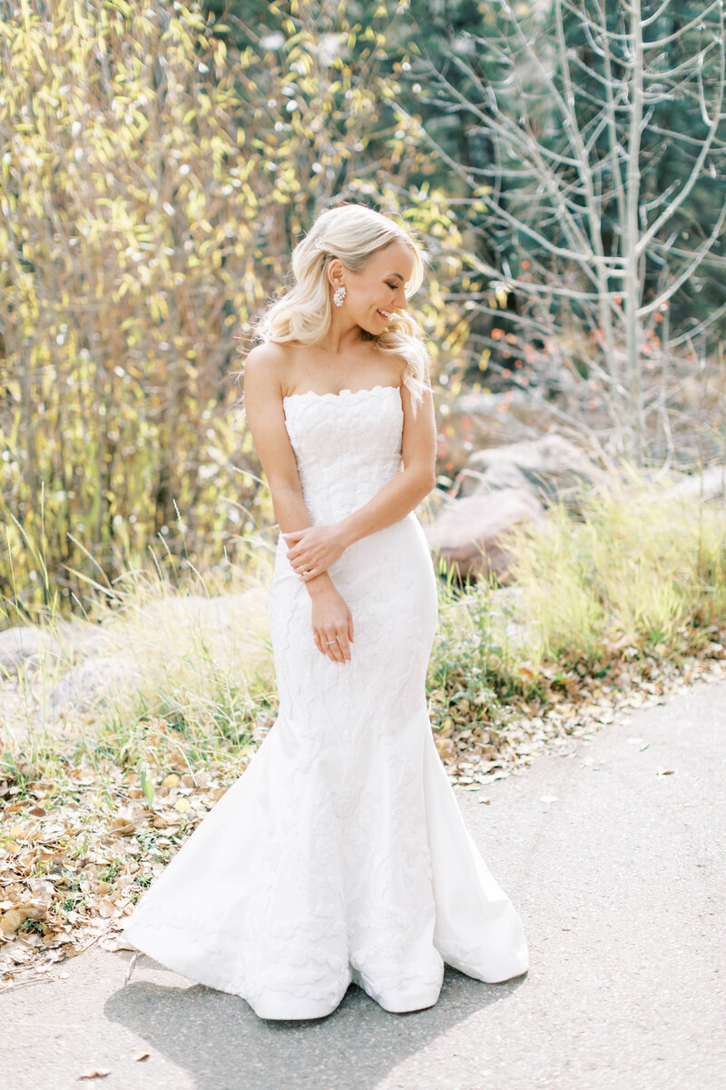 Bride showing off her beautiful Anna Be Bridal wedding gown in Vail Colorado before her Donovan Pavilion wedding.