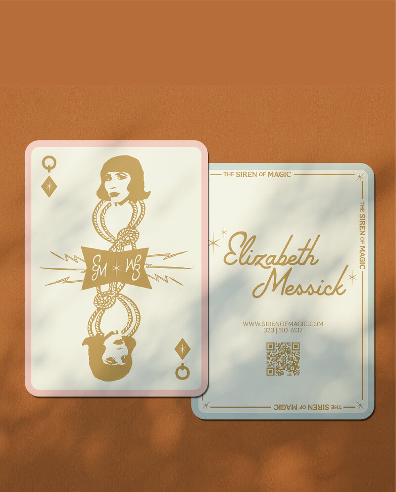 business cards for a magician designed in a playing card style as the queen of hearts