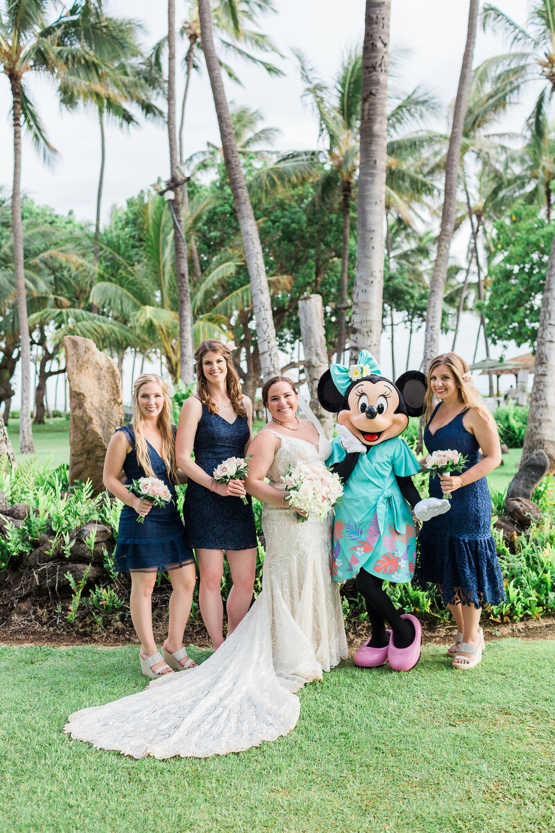Minnie mouse with bride and bridesmaids at Disney wedding