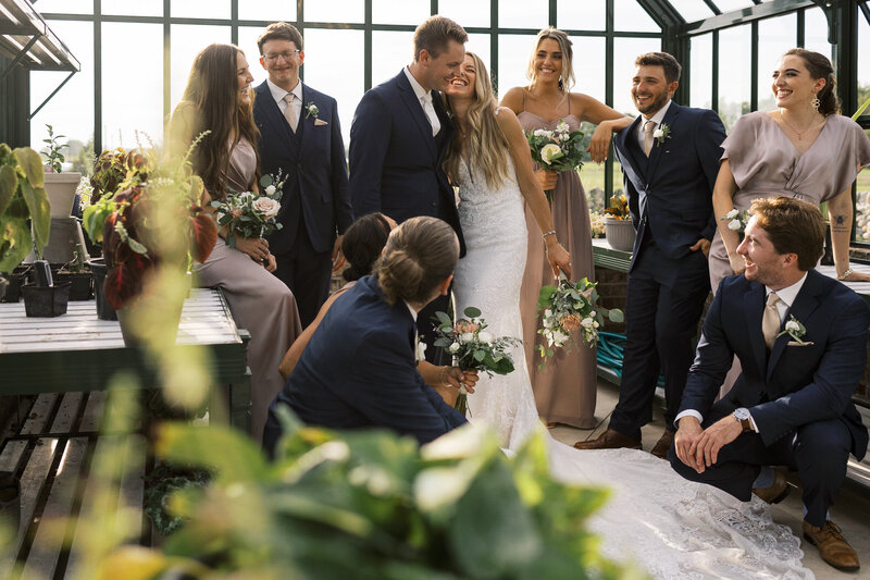 Wedding party photos in a greenhouse taken by Allexx B Photography Milwaukee + Chicago Wedding Photographer