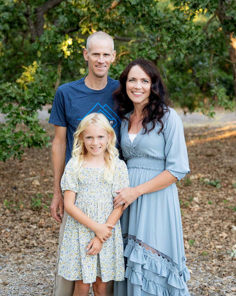 Thousand Oaks headshot photographer, Alyson Berg and her family smiling for camera