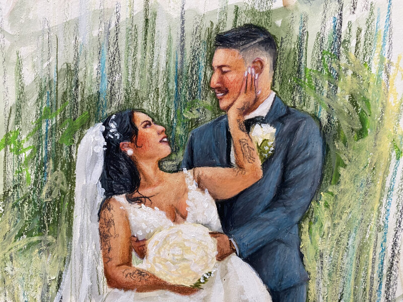 A portrait of a married couple smiling and looking at one another while in a field. 